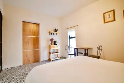 Cama o camas de una habitación en Hermosa Suite Privada en Casa Holística