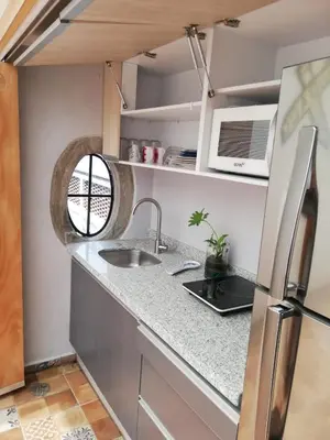 Una cocina o zona de cocina en Hermosa Suite Privada en Casa Holística