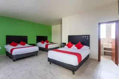 Cama o camas de una habitación en Capital O Hotel Emperadores Inn, Atlixco