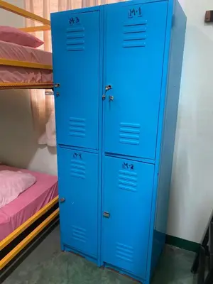 Cama o camas de una habitación en Nopalero Hostel