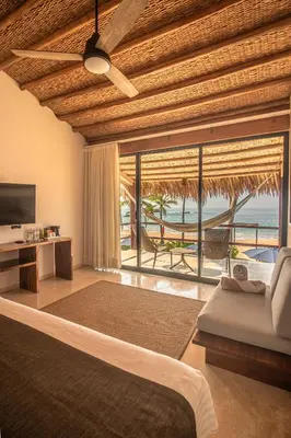 Una televisión o centro de entretenimiento en Casa Lu Hotel Boutique