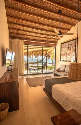 Cama o camas de una habitación en Casa Lu Hotel Boutique