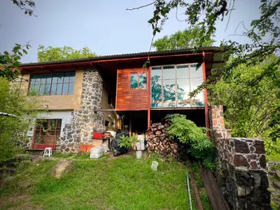 Jardín al aire libre en Santuario Ave Fénix-Cabañas