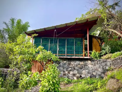 Jardín al aire libre en Santuario Ave Fénix-Cabañas