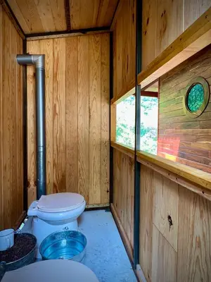 Un baño de Santuario Ave Fénix-Cabañas