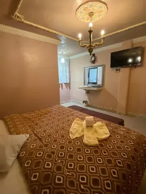 Cama o camas de una habitación en Hotel Plaza