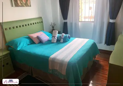 Cama o camas de una habitación en Aruma Cuernavaca