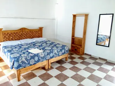 Cama o camas de una habitación en Hotel Juarez