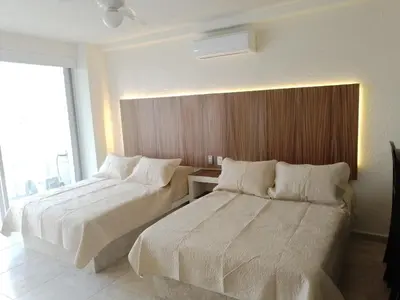 Cama o camas de una habitación en Acapulco suites Y condominio Mediterrane