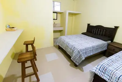 Cama o camas de una habitación en Posada del Rey Azúcar