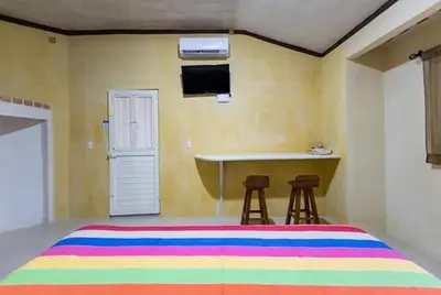 Cama o camas de una habitación en Posada del Rey Azúcar