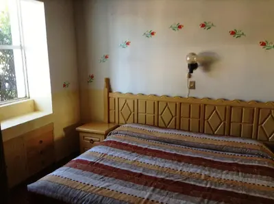 Cama o camas de una habitación en Villas de la Montaña