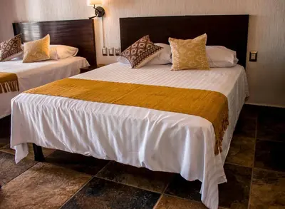 Cama o camas de una habitación en Hotel Casa del Agua