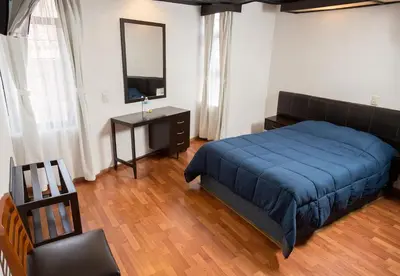 Cama o camas de una habitación en Hotel Central Teziutlan