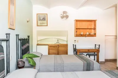 Cama o camas de una habitación en Posada de los Angeles