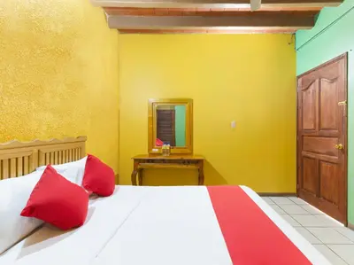 Cama o camas de una habitación en Hotel Posada San Rafael