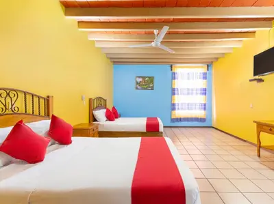Cama o camas de una habitación en Hotel Posada San Rafael