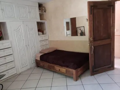 Cama o camas de una habitación en Hotel Juliantla