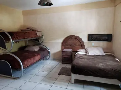 Cama o camas de una habitación en Hotel Juliantla
