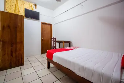 Cama o camas de una habitación en OYO Hotel Betsua Vista Hermosa, Huatulco