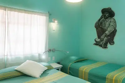 Cama o camas de una habitación en Casa de Don Pablo Hostel