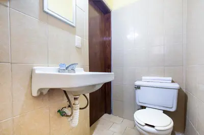 Un baño de OYO Hotel Y Restaurante Mitla, Oaxaca