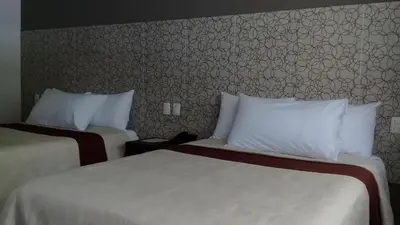 Cama o camas de una habitación en Hotel Verdi