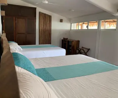 Cama o camas de una habitación en Casa Estrella Fugaz Rinconcito Mazunte