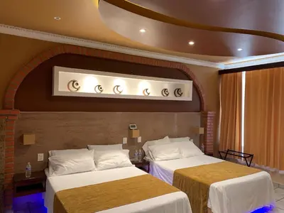 Cama o camas de una habitación en Hotel Boutique TEKALI INN