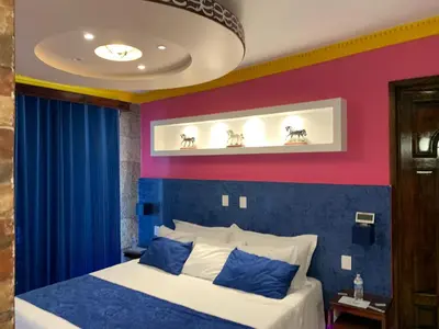Cama o camas de una habitación en Hotel Boutique TEKALI INN