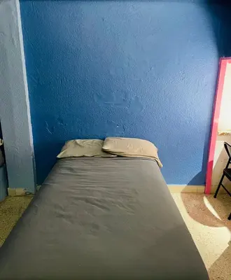 Cama o camas de una habitación en Hotel magallanes con cocineta 100 Metros de playa