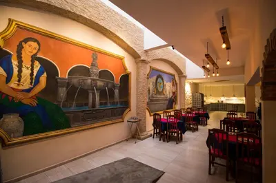 Un restaurante o sitio para comer en Hotel Santa Rosa