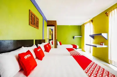 Cama o camas de una habitación en OYO Hotel Rey David, Oaxaca