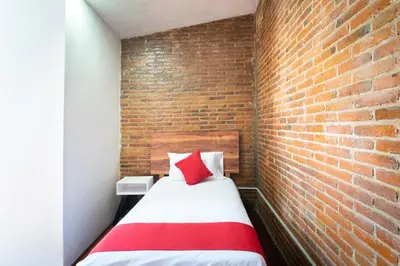 Cama o camas de una habitación en Hotel de Guadalupe
