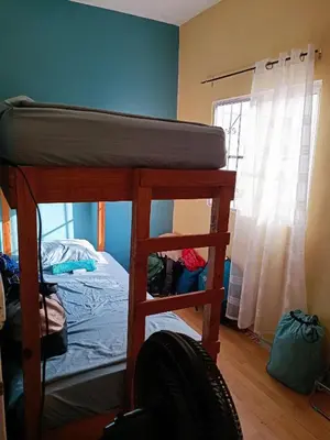 Cama o camas de una habitación en Hostal a 10 min del centro de Veracruz
