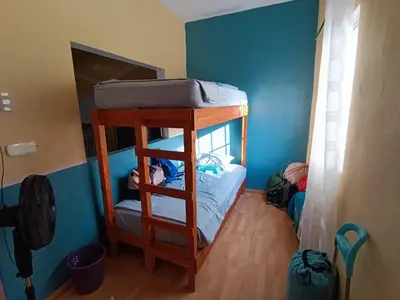 Cama o camas de una habitación en Hostal a 10 min del centro de Veracruz