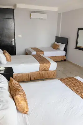Cama o camas de una habitación en Hotel Costa Verde