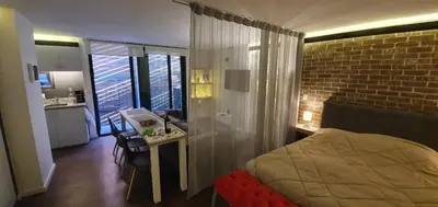 Cama o camas de una habitación en Small cozy apartment in the historic center