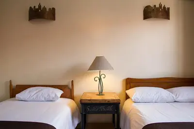 Cama o camas de una habitación en Hotel Posada Santa Bertha