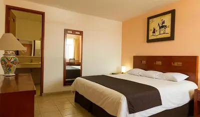 Cama o camas de una habitación en Hotel Posada Santa Bertha