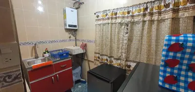 Una cocina o zona de cocina en Departamentos muy cercanos al aeropuerto T2 wifi free