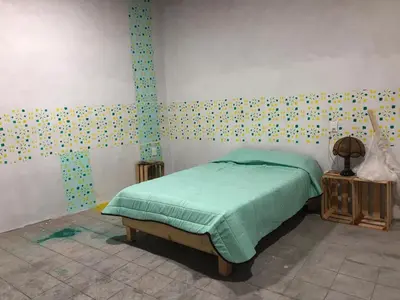 Cama o camas de una habitación en Ojo de Luna Teotitlan
