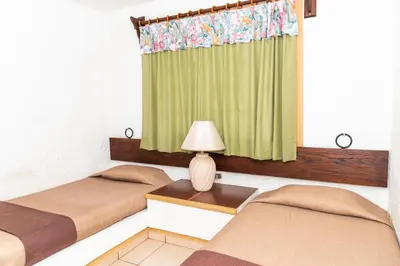 Cama o camas de una habitación en Hotel Villas Santa Ana