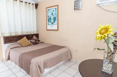 Cama o camas de una habitación en Hotel Villas Santa Ana