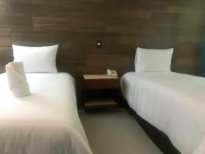 Cama o camas de una habitación en Malinalli Express