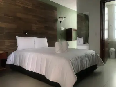 Cama o camas de una habitación en Malinalli Express