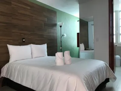 Cama o camas de una habitación en Malinalli Express