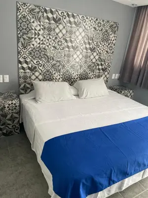 Cama o camas de una habitación en Hotel Rias