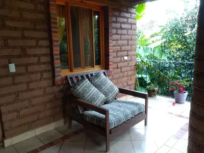 Zona de estar de Hotel Casa Pomarrosa