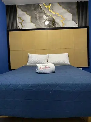 Cama o camas de una habitación en Hotel Puerto México Aeropuerto